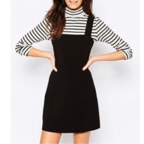 black fitted pinafore dress